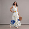 Robe bohème chic blanche fluide à imprimé fleurs bleues, col en V