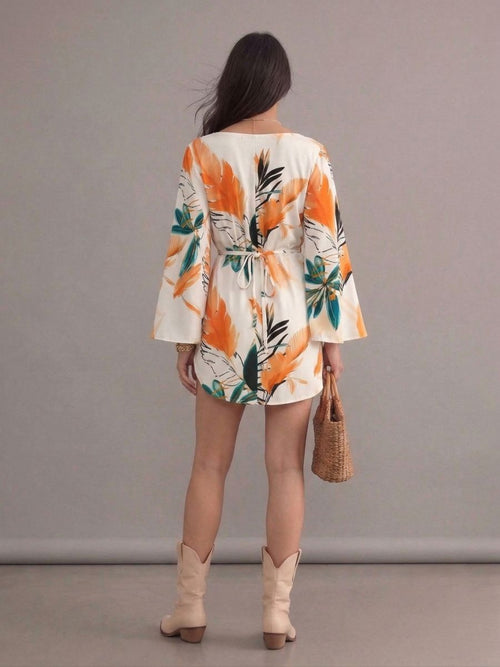 Robe bohème blanche et orange col en V manches chauve-souris imprimées