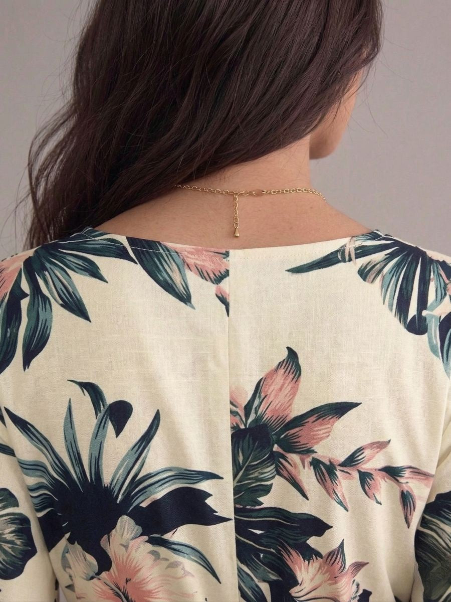 Robe bohème beige col en V manches chauve-souris imprimées