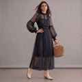 Robe bohème noire romantique en dentelle à manches longues